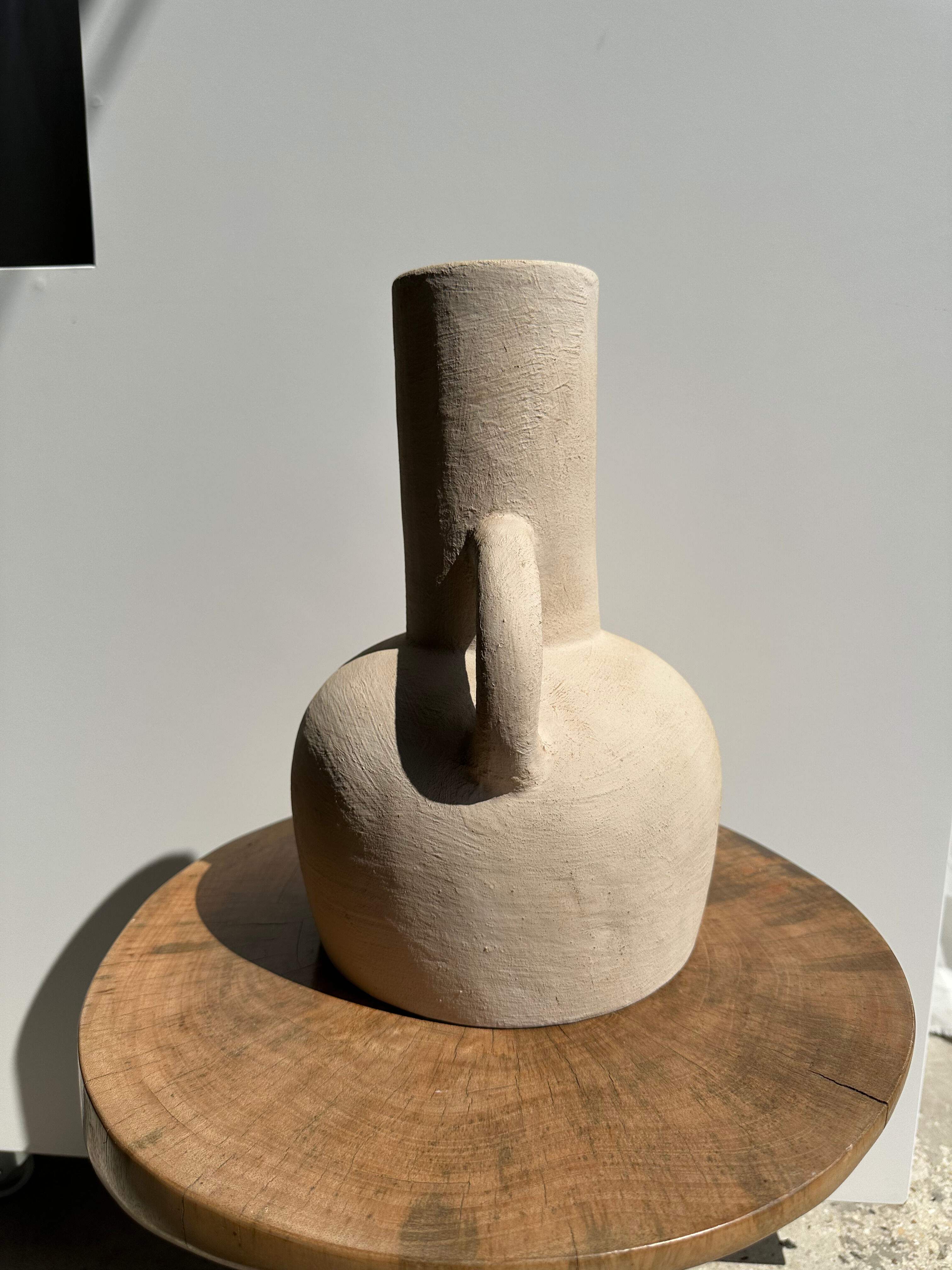 Handmade terracotta vase painted in beige with double handles h:32 d:25