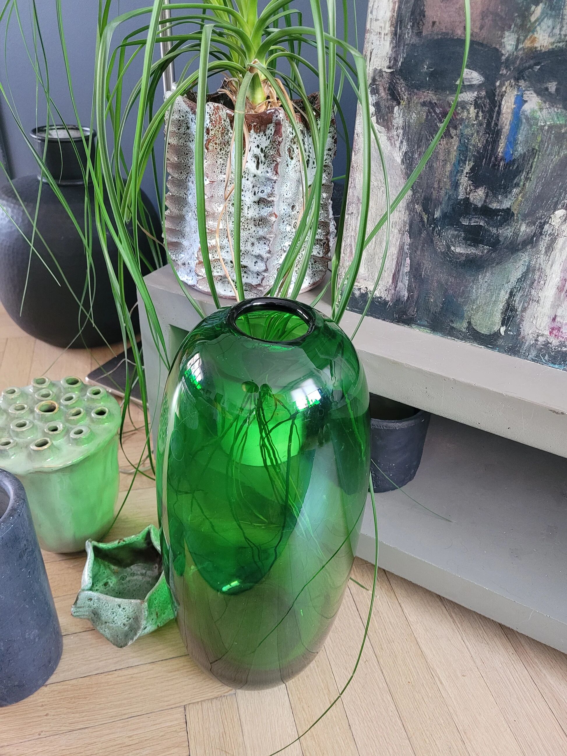 Large green glass vase