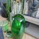 Large green glass vase