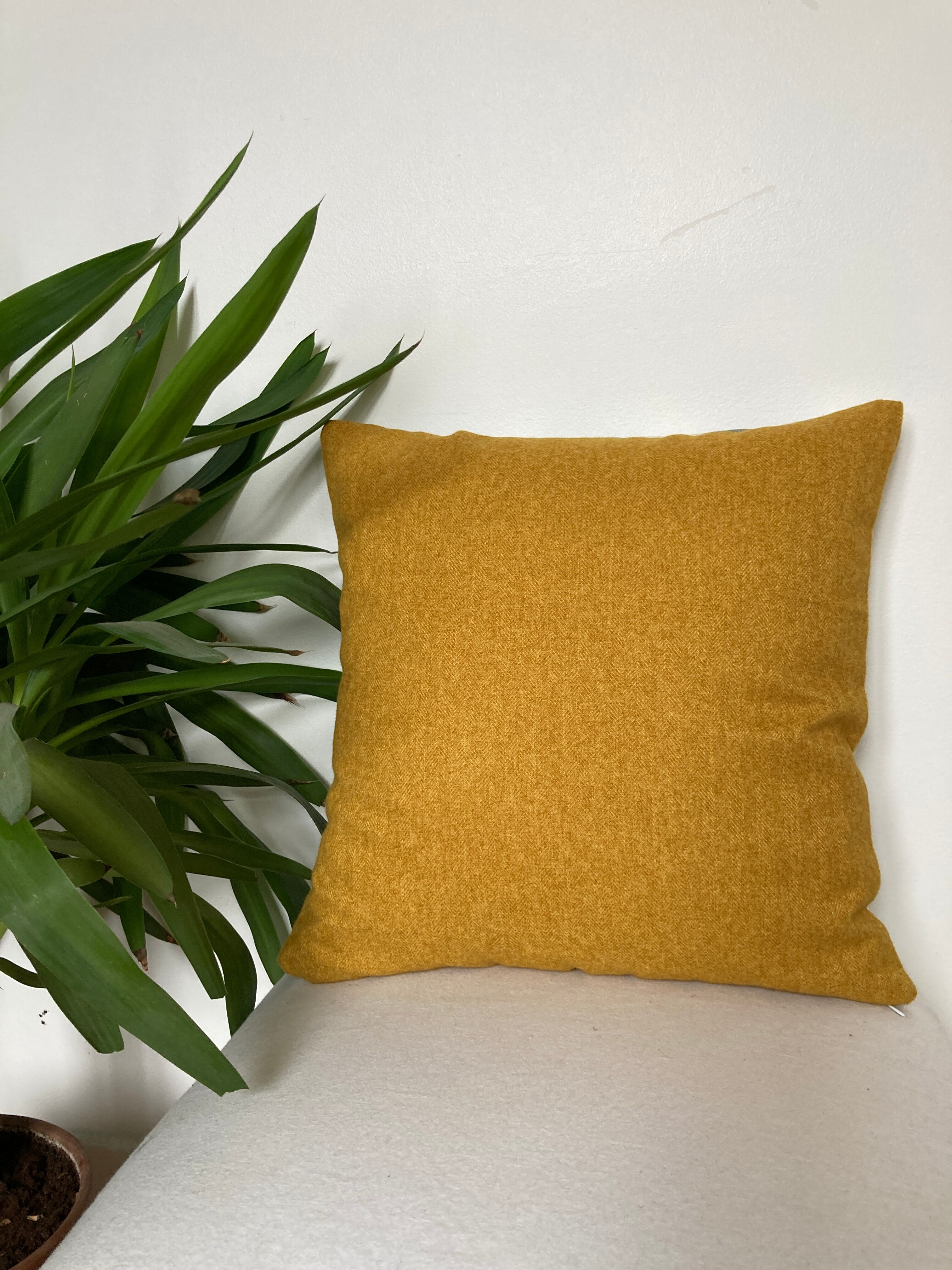 Two-sided stripe cushion solid green tones mustard