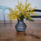 Small blue enamelled vase