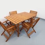 Vintage garden furniture set consisting of a table with extensions and 4 armchairs
