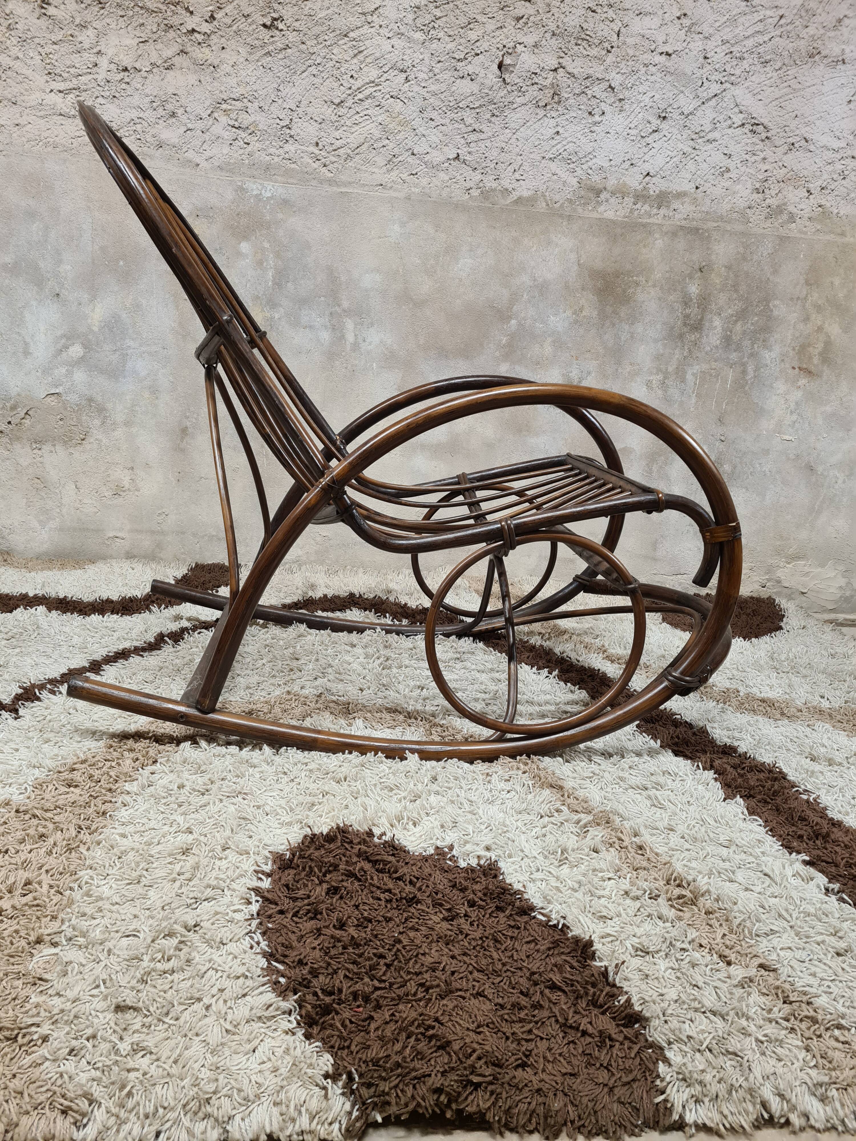 Rocking-chair in rattan bamboo 1970 vintage