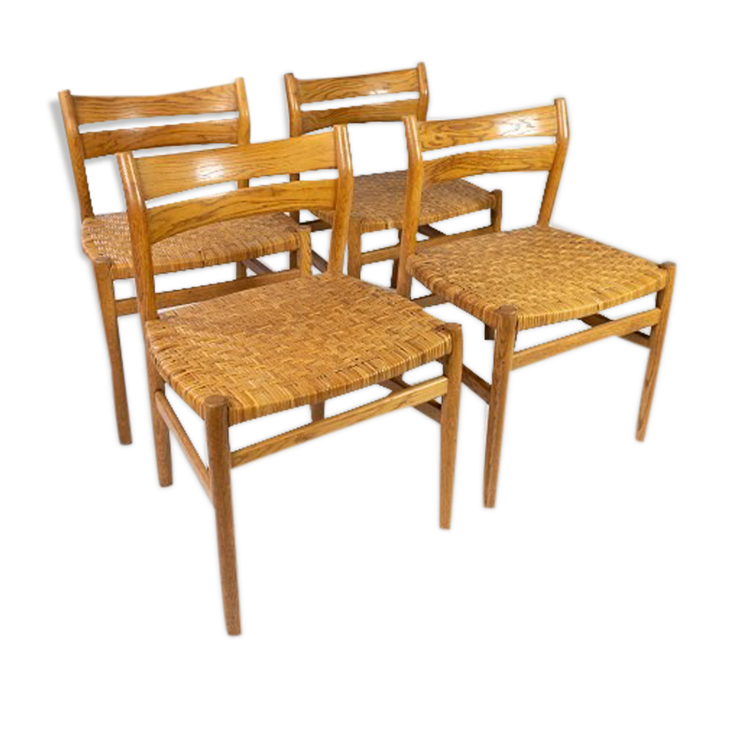 A set of four dining room chairs in oak and seat in papercord, designed by Børge Mogensen