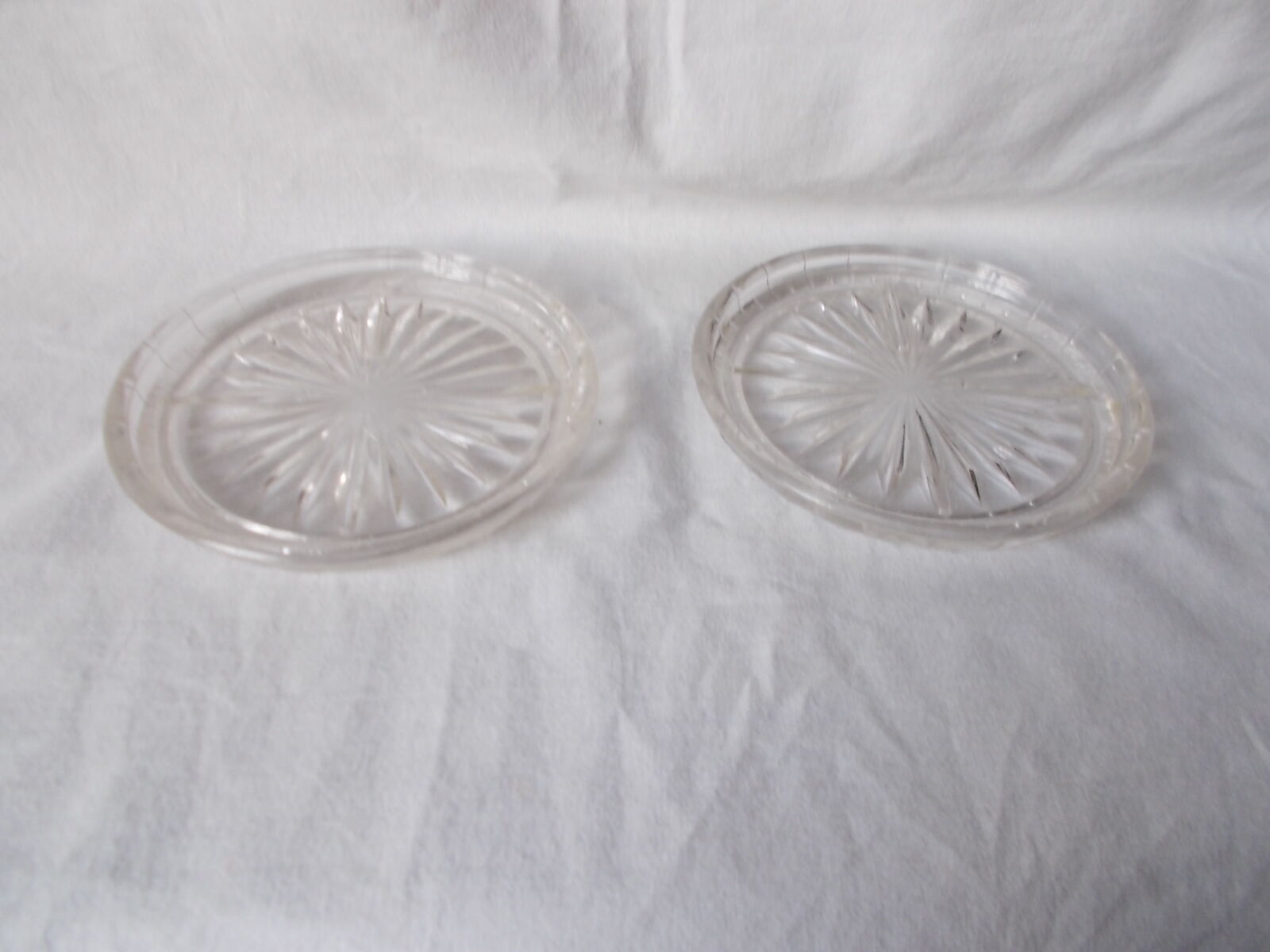 Pair of molded glass bottle mats