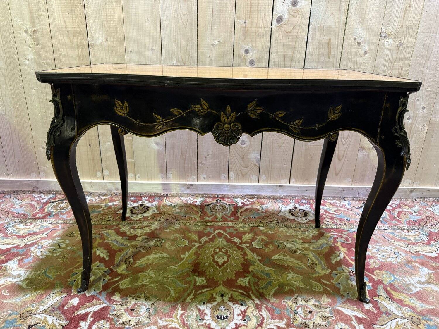 Louis XV style console table in blackened wood.