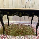 Louis XV style console table in blackened wood.