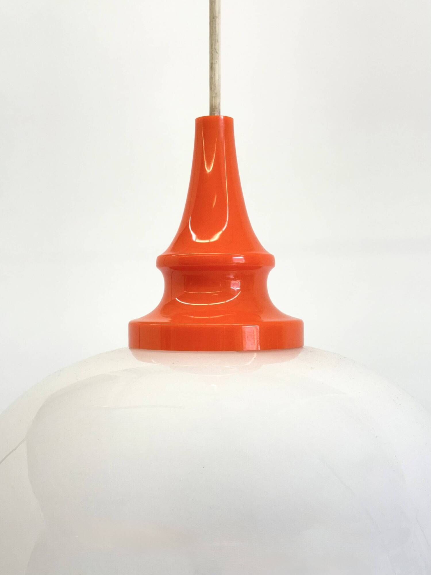 Space Age pendant lamp with milk glass ball and orange accents