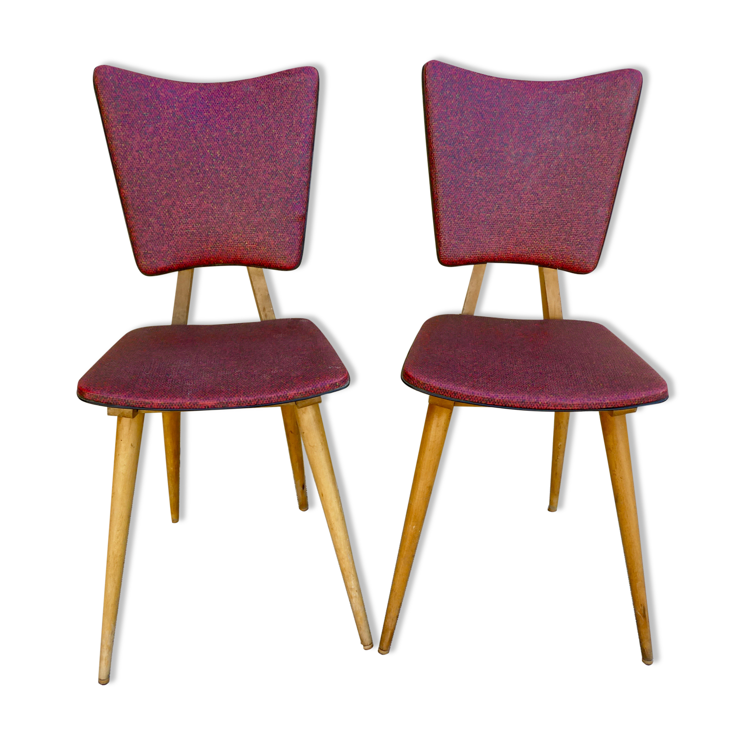 Pair of wooden chairs and red skai, 50s