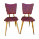 Pair of wooden chairs and red skai, 50s