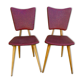 Pair of wooden chairs and red skai, 50s