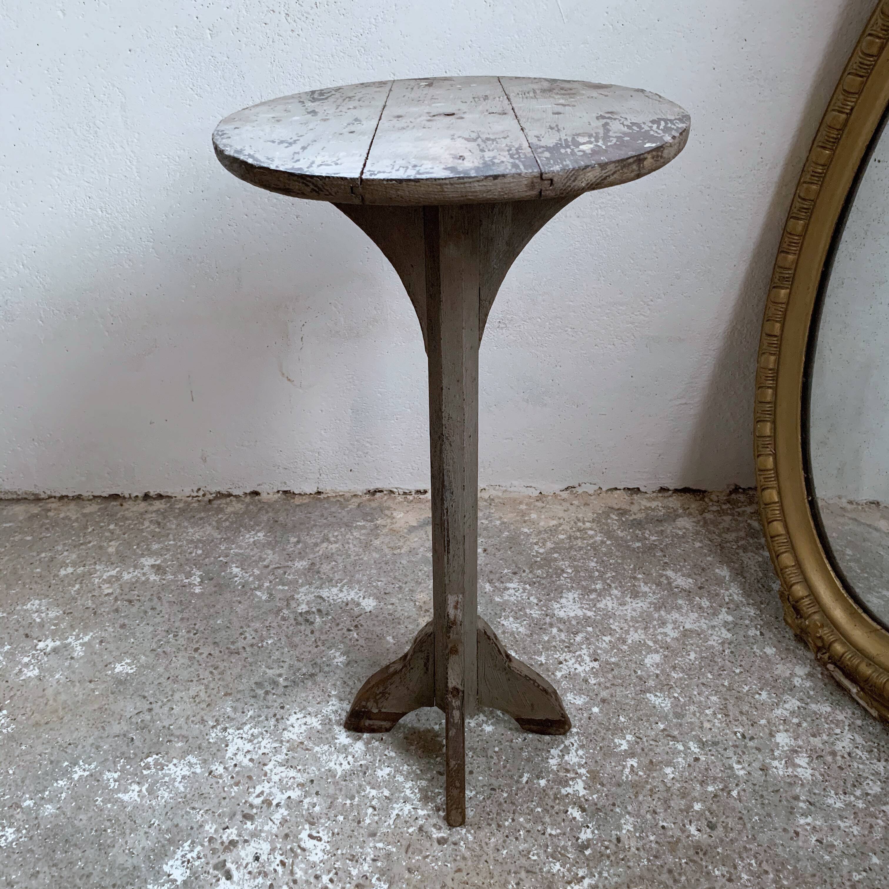 wooden pedestal or primitive winemaker's table