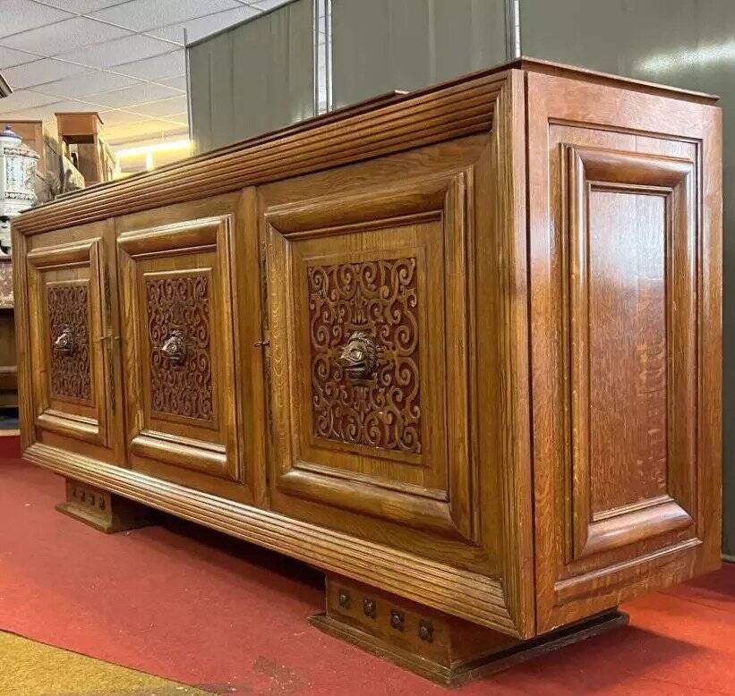 According to Charles Dudouyt: sideboard in a row from the Art Deco period in solid wood.