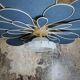 Flower suspension in linen, rattan and vintage old globe