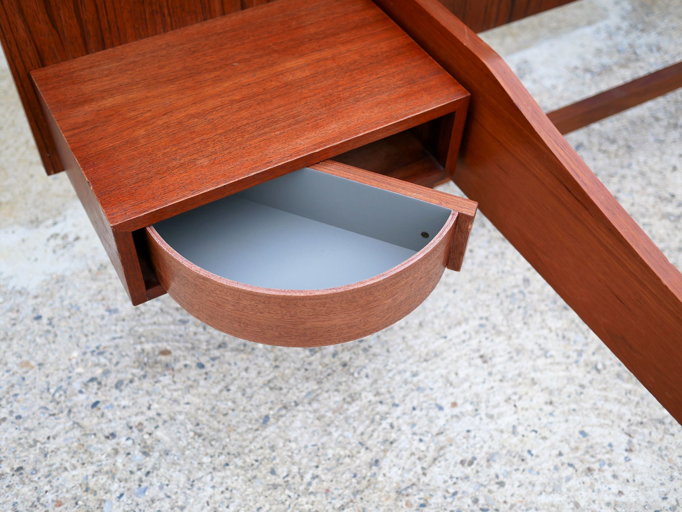 Teak bed with hanging bedside tables from the 60s