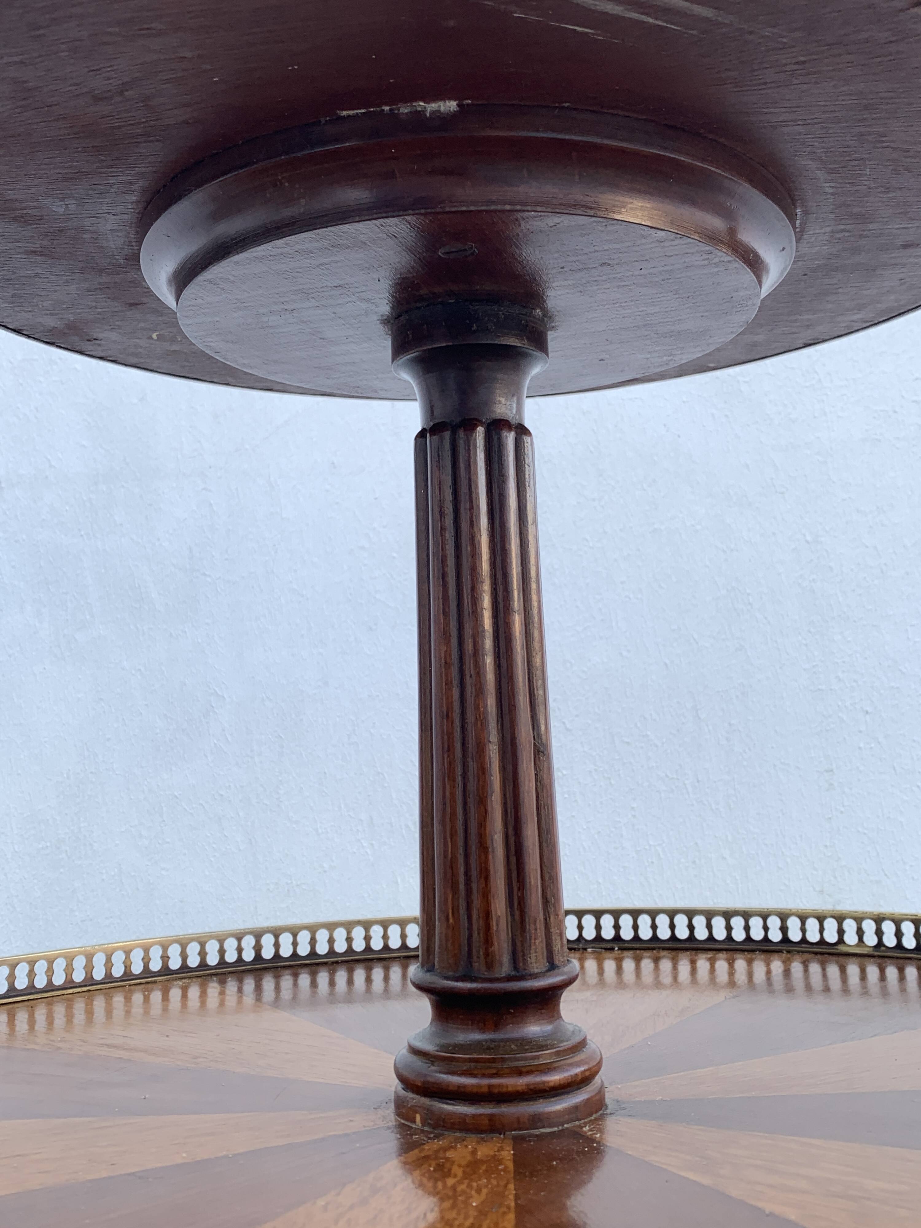Late 19th century tripod pedestal table in wood marquetry