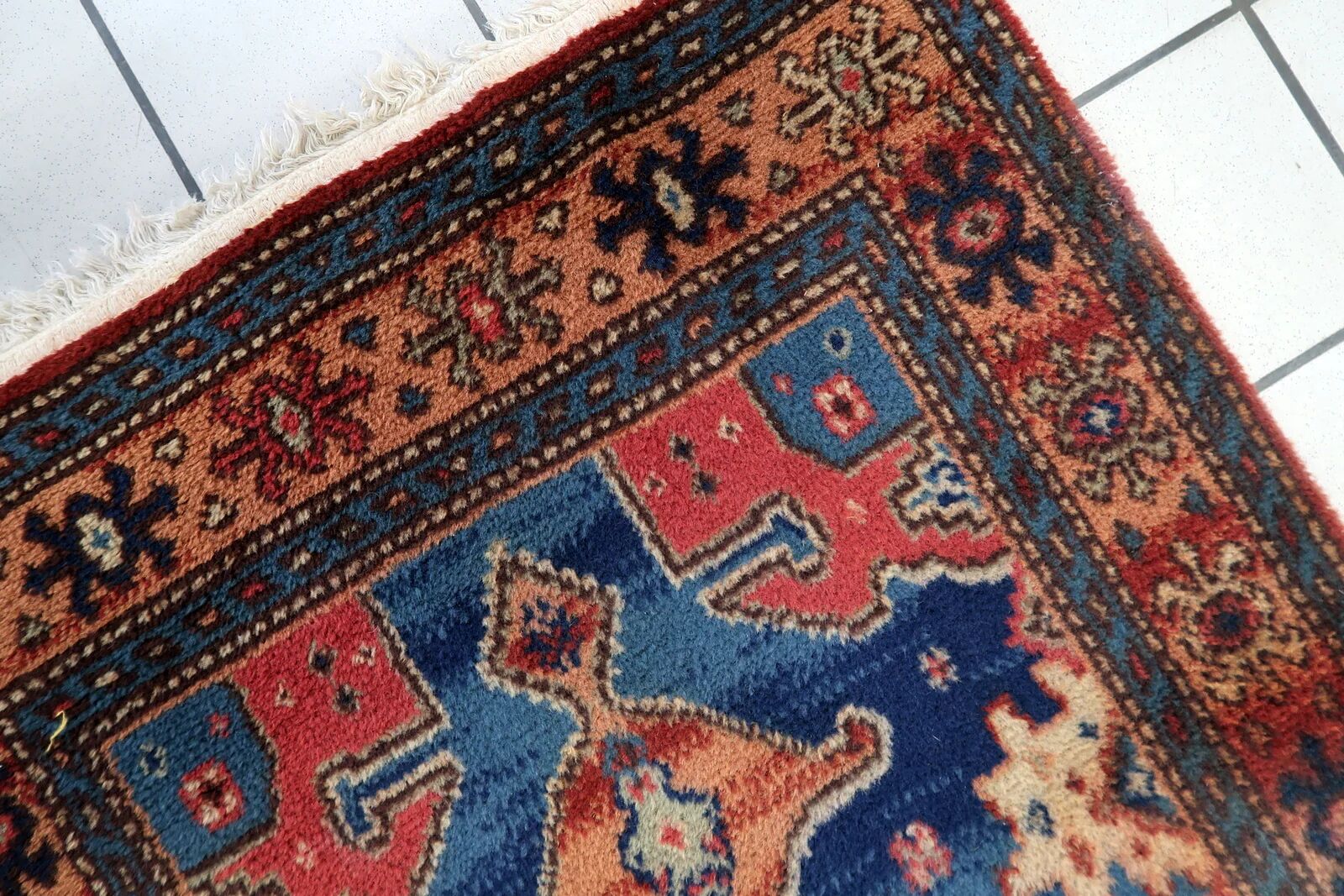 Vintage 1950s German tribal style wool rug, geometric medallion, 84cm x 180cm