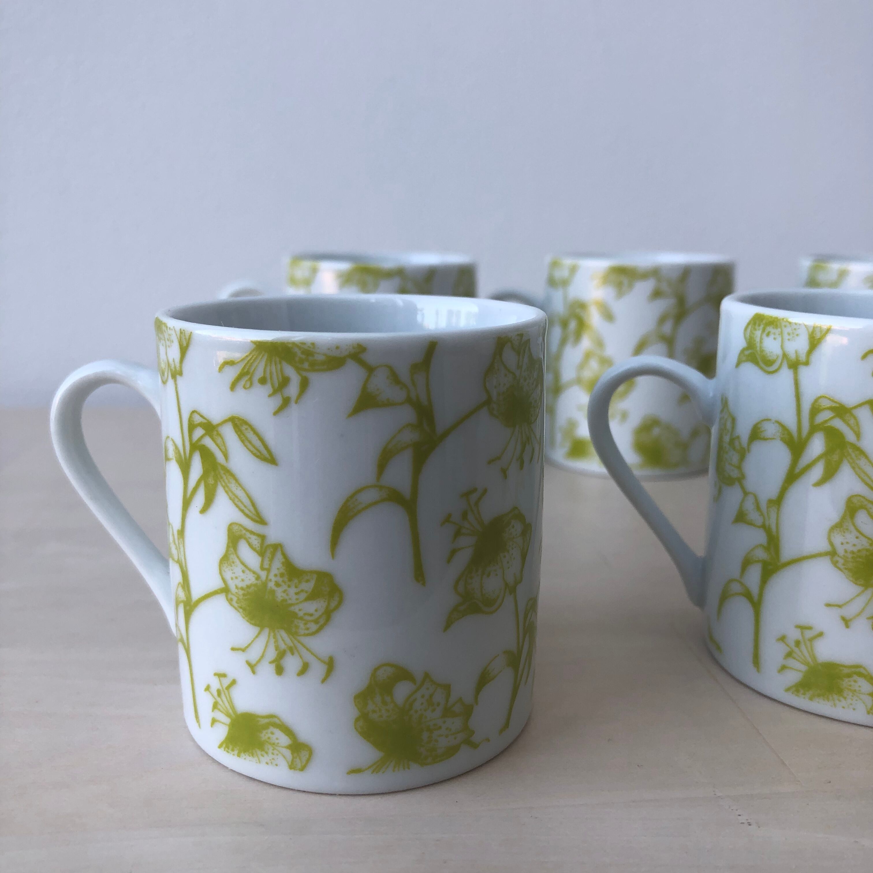 Porcelain coffee cups, green flower patterns