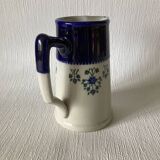 Saint-Uze pitcher in blue and white steel clay with floral decoration