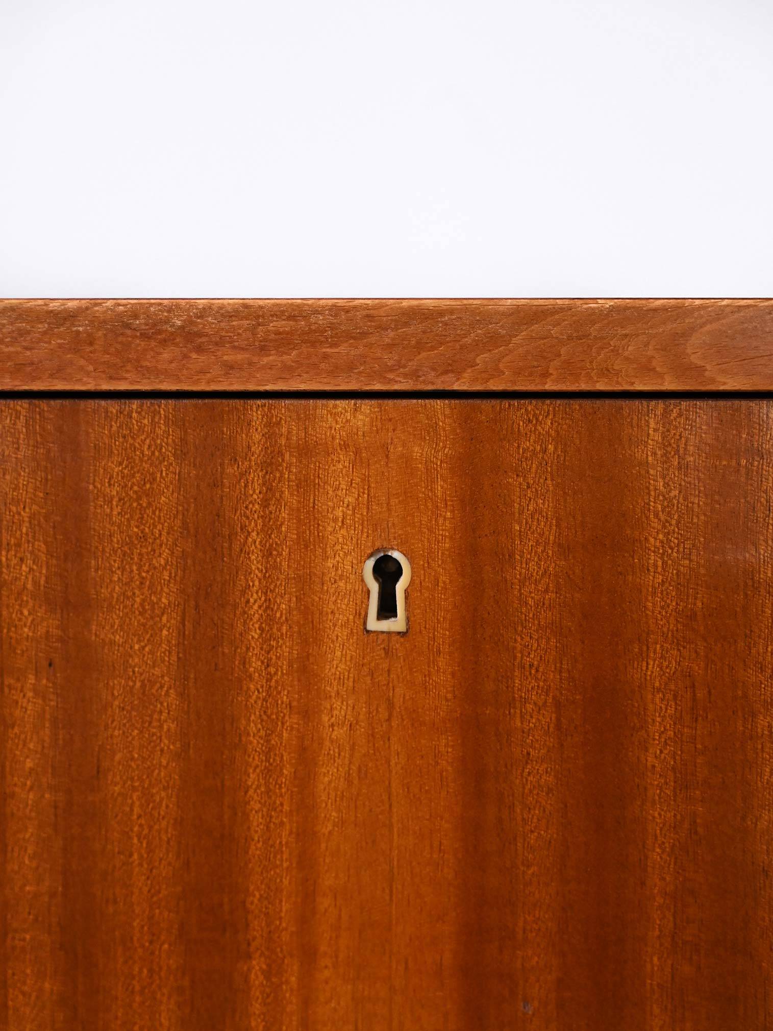 Scandinavian chest of drawers with metal handles