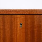Scandinavian chest of drawers with metal handles