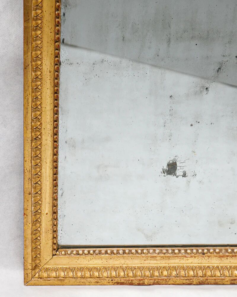 Miroir rectangulaire de style Louis XVI avec verre renardé