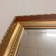 XL vintage bevelled mirror with a gold frame.