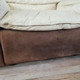 Fauteuil avec pouf en cuir et daim