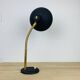 Vintage lamp from the 1950s in brass and black.