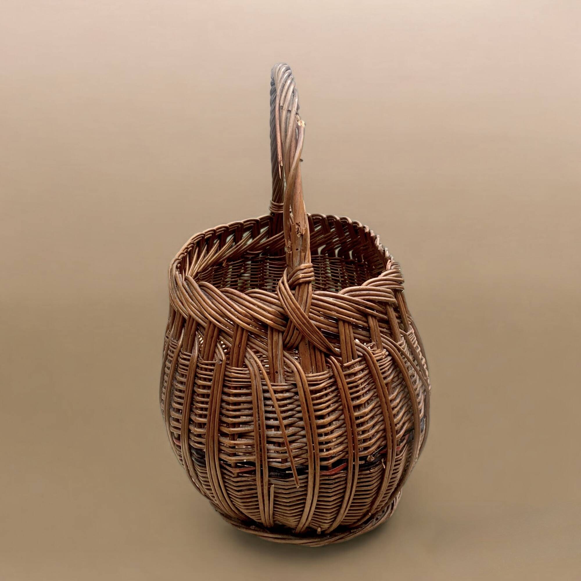 Old woven wicker basket and scoubidou