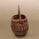 Old woven wicker basket and scoubidou