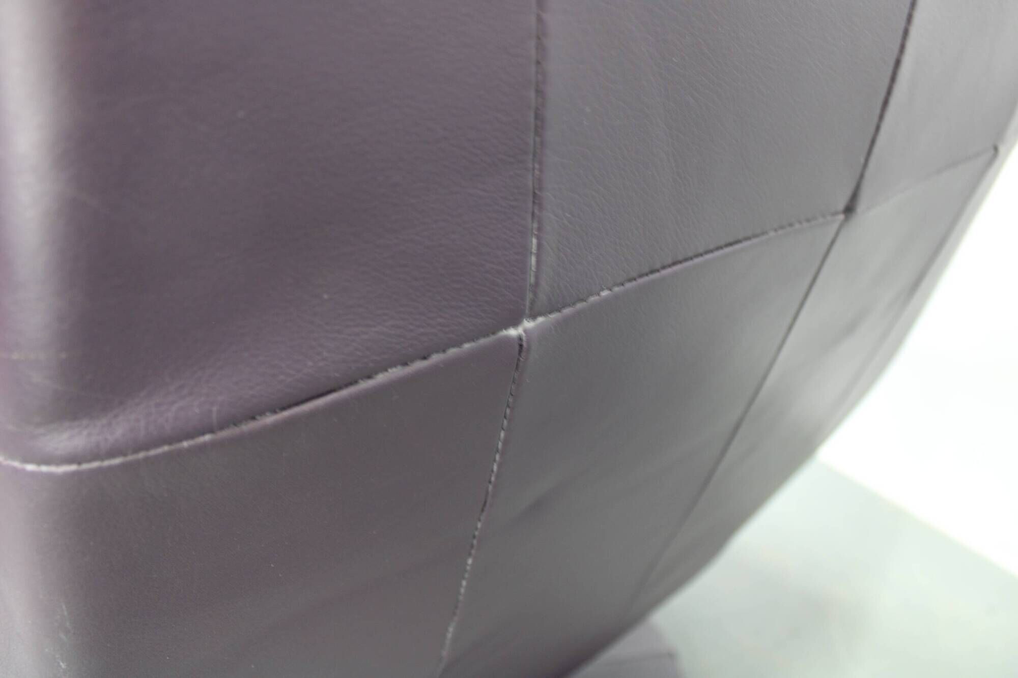 Italian dark purple leather swivel lounge chair, 1980s