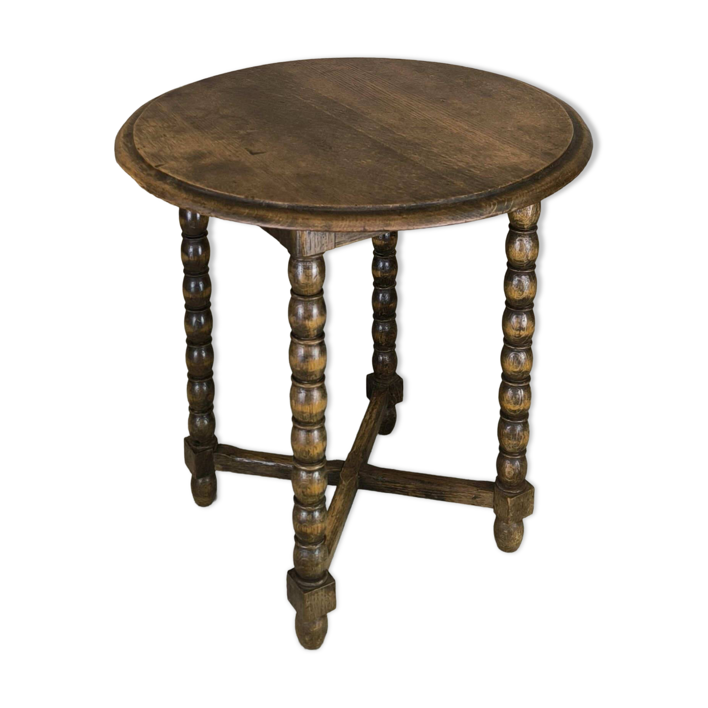 Vintage gueridon with beaded wooden legs.