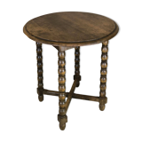 Vintage gueridon with beaded wooden legs.