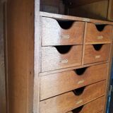 Old black wardrobe - wooden drawers and labels of origin