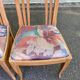 2 dining or kitchen chairs with high backs and fabric.