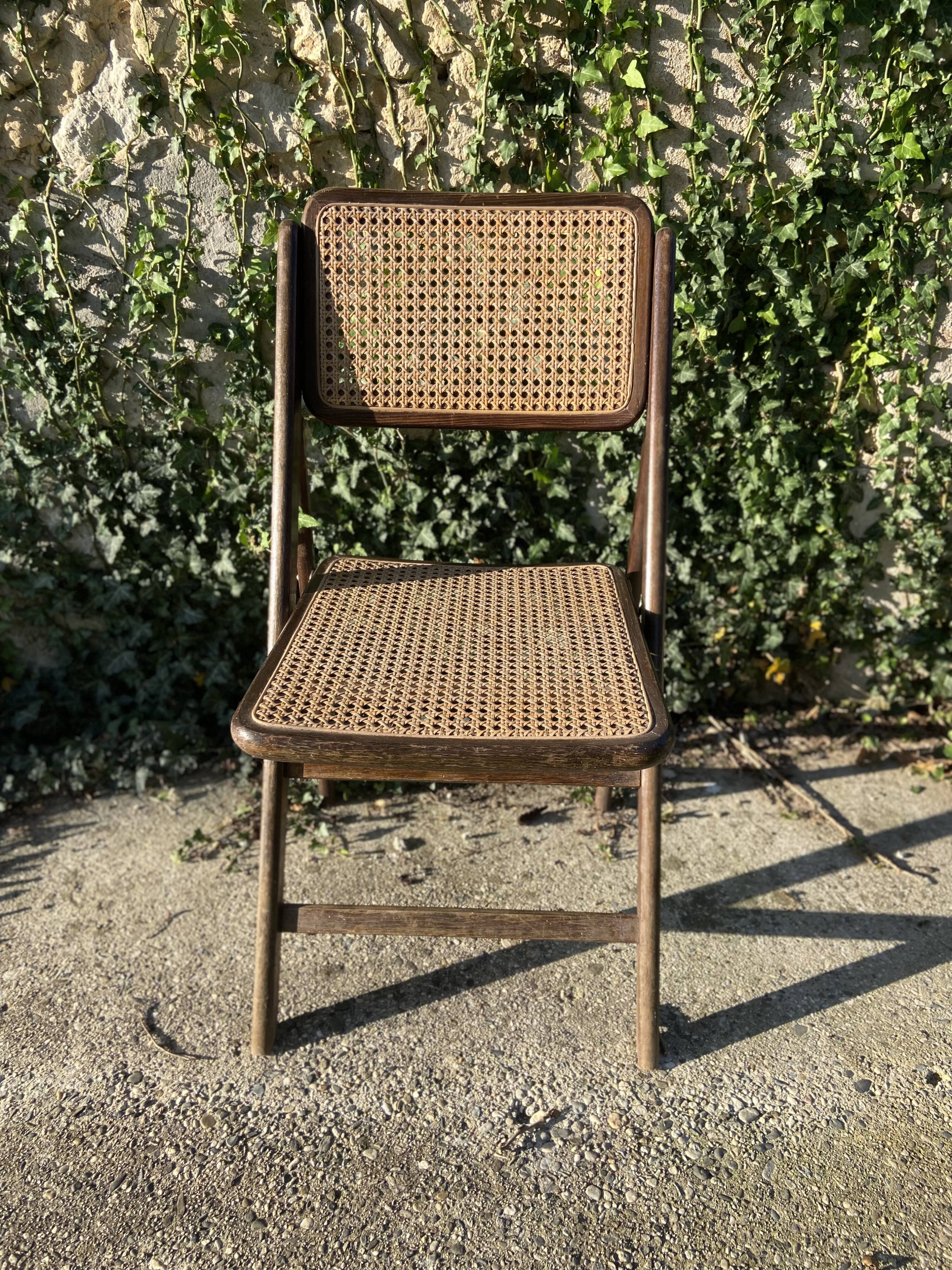 Folding chair in wood and cane.