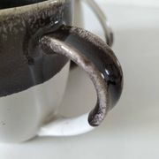Set of three two-tone mugs, glazed stoneware, café workshop style.