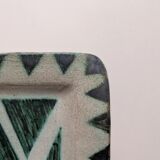 Ceramic pocket emptier