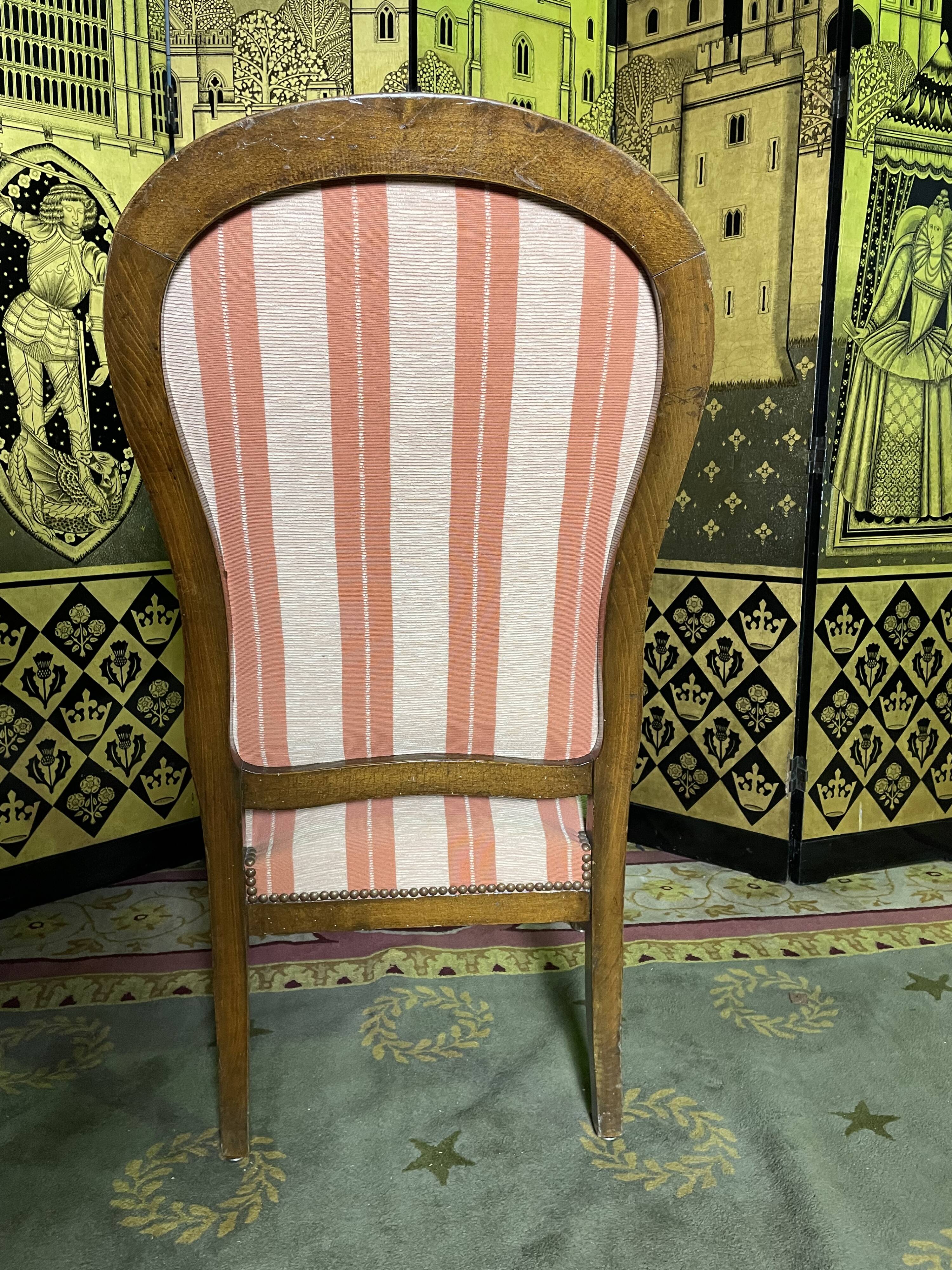 Voltaire walnut armchair