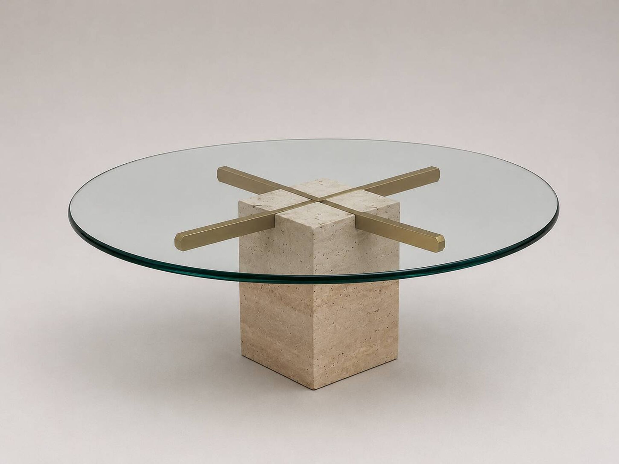 Vintage round coffee table with thick glass top and travertine and brass base