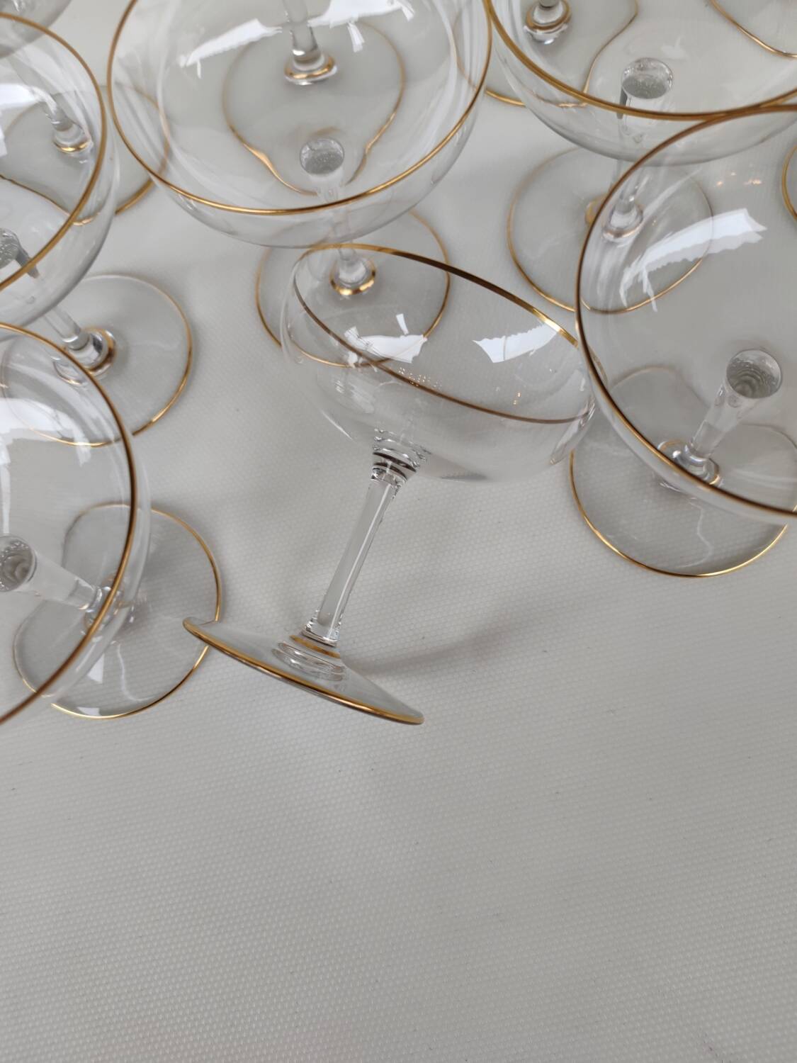 12 Baccarat crystal champagne coupes, circa 1900.