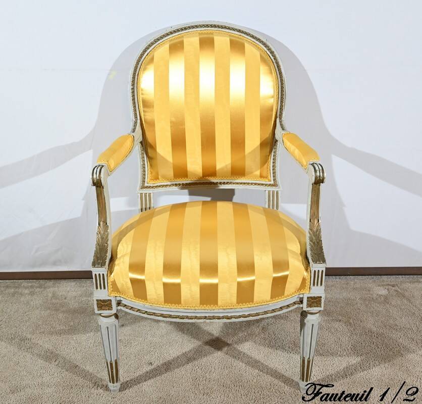 Pair of Cabriolet Armchairs, in rechampi wood, Louis XVI style – Late 19th century