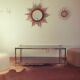 Table basse vintage dorée et verre fumé Rochebobois années 80