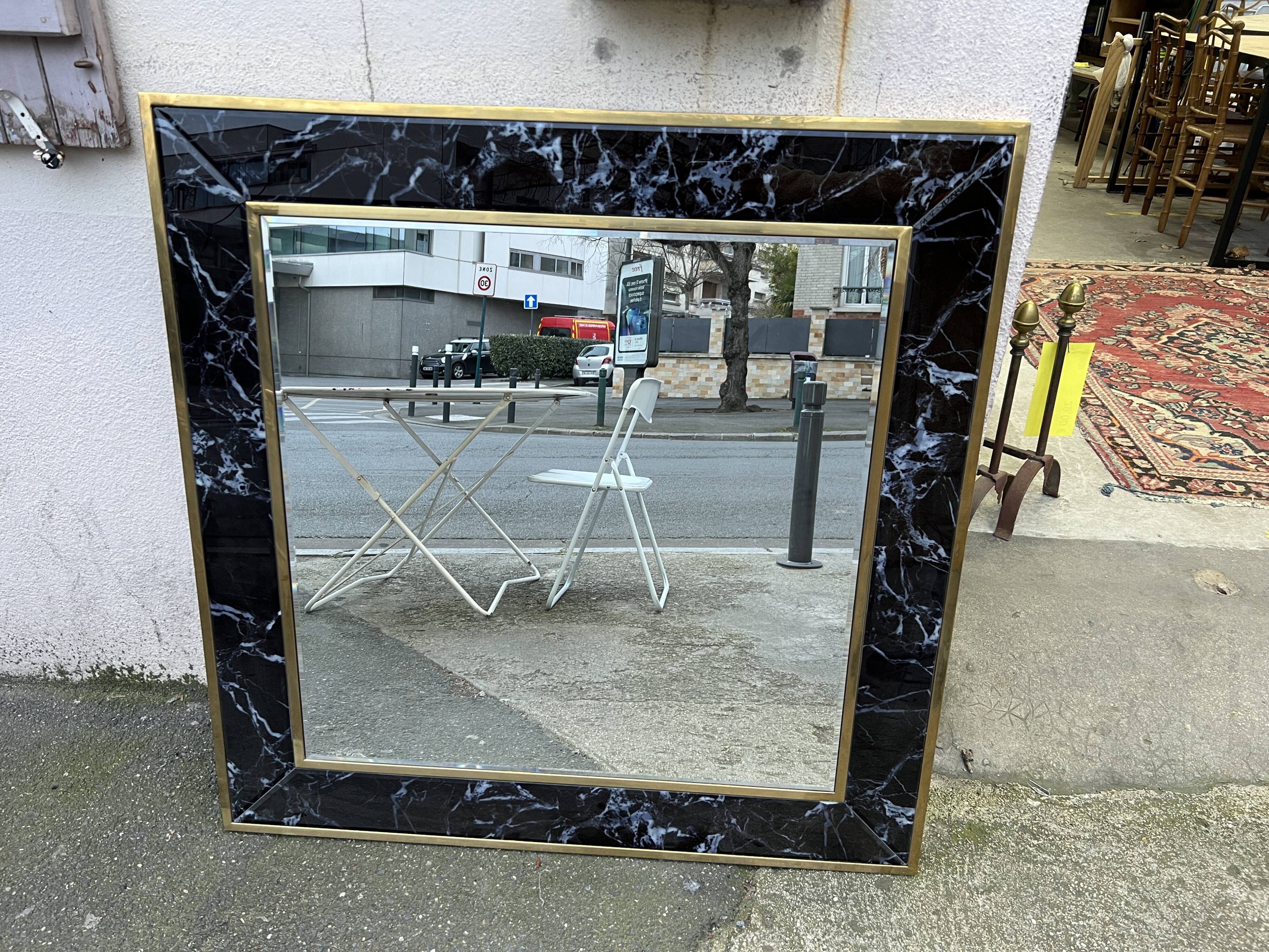 Mirror in brass and white veined black marble from the 70s