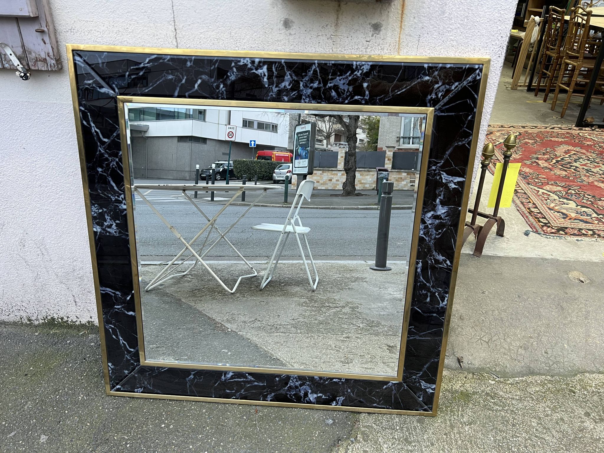 Mirror in brass and white veined black marble from the 70s