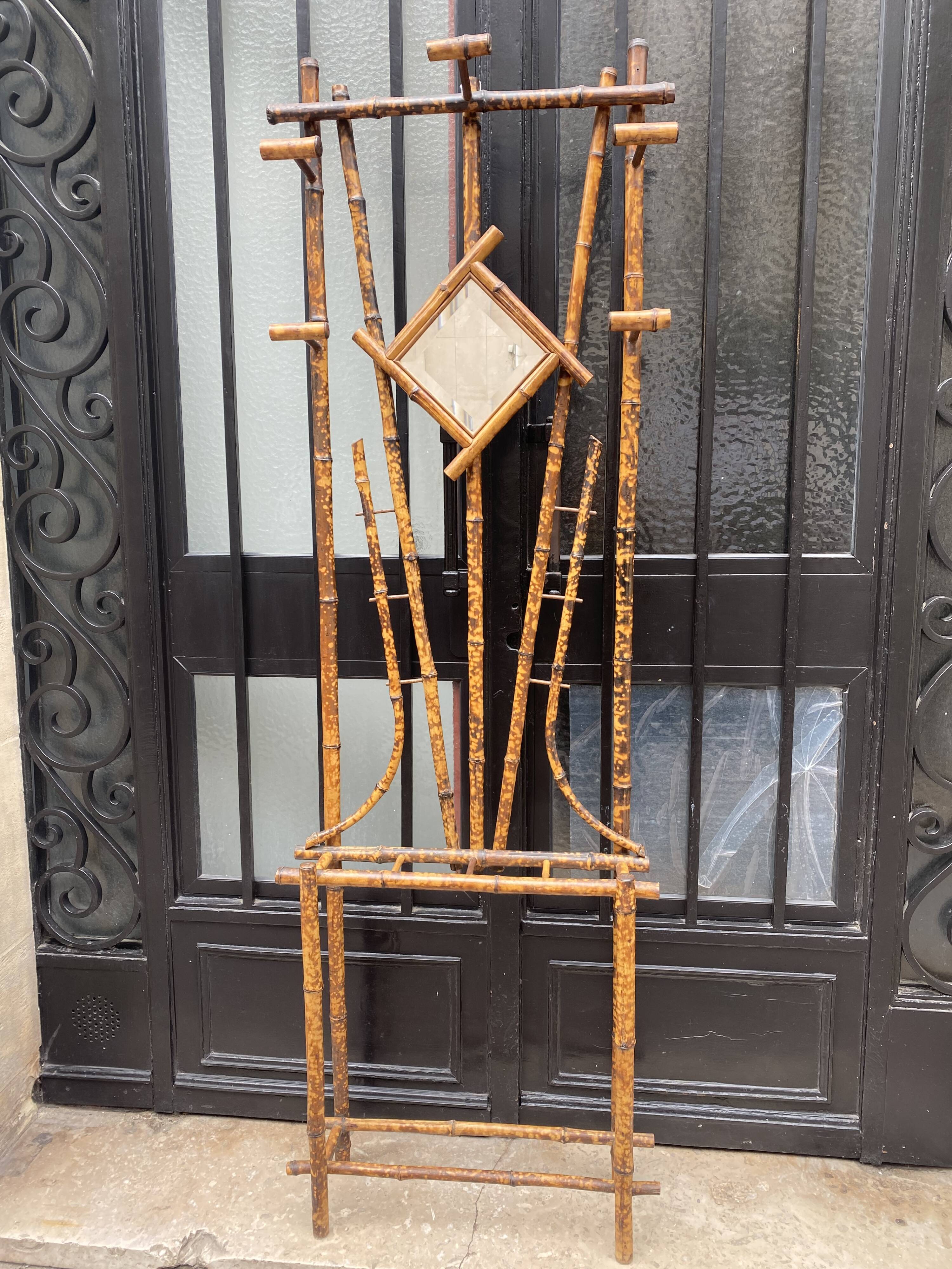 Vintage patinated bamboo coat holder