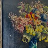 Still life with vase and bouquets of flowers