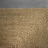 Brown flat-woven jute Indian rug, 1970.