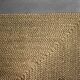 Brown flat-woven jute Indian rug, 1970.
